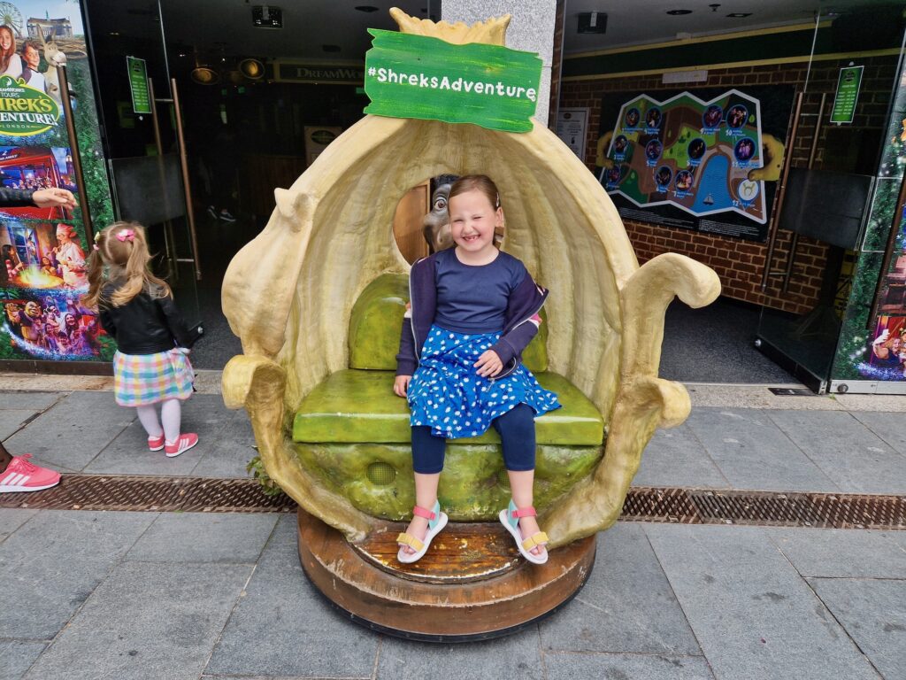 Erin sat outside Shrek's Adventure London