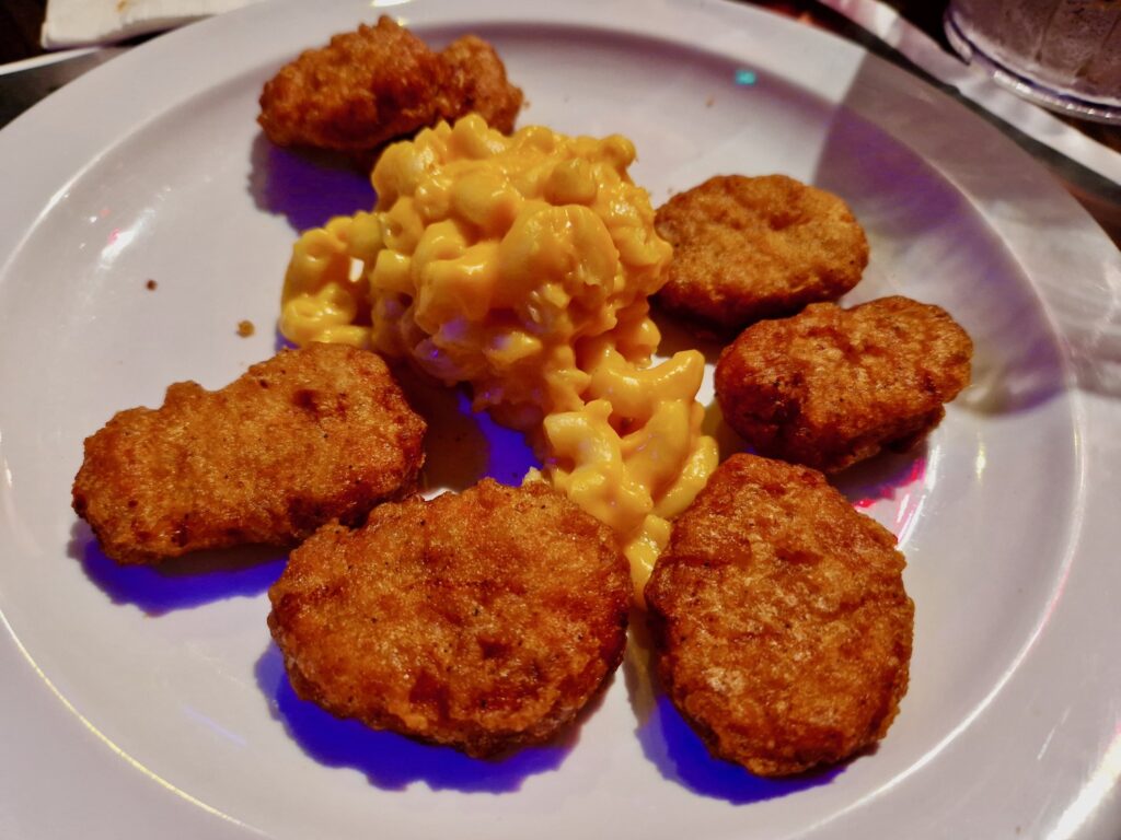 Golden Chicken Nuggets served with Creamy Macaroni & Cheese.