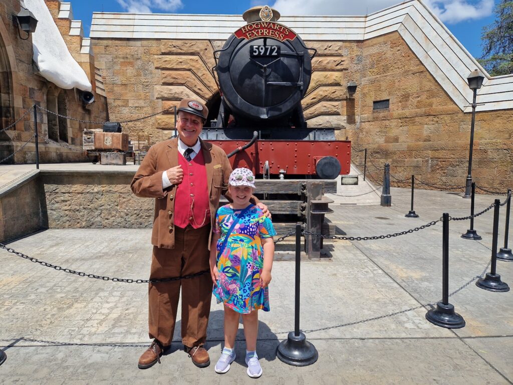 Erin with the train driver at Hogsmeade