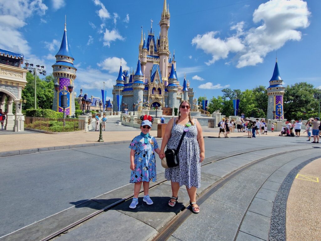 Me and Erin in front of the castle at Magic Kingdom