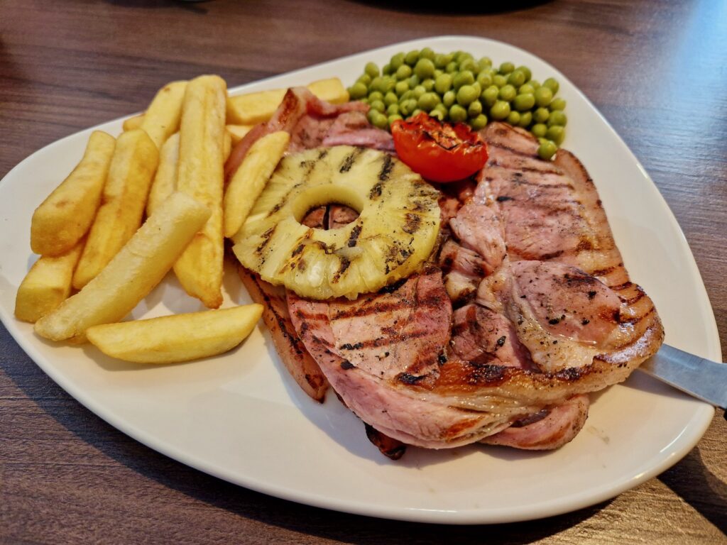 The Sitting Duck gammon, pineapple, chips and peas