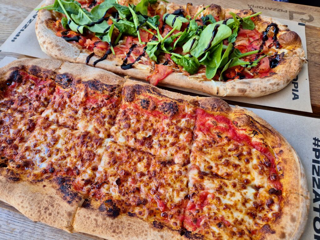 Cheese pizza, and vegan pizza, from Pizzatopia in Poznan