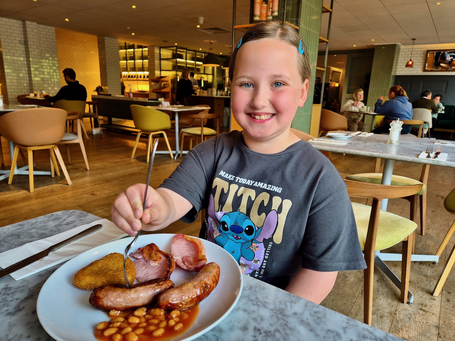 Erin eating breakfast at Novotel York