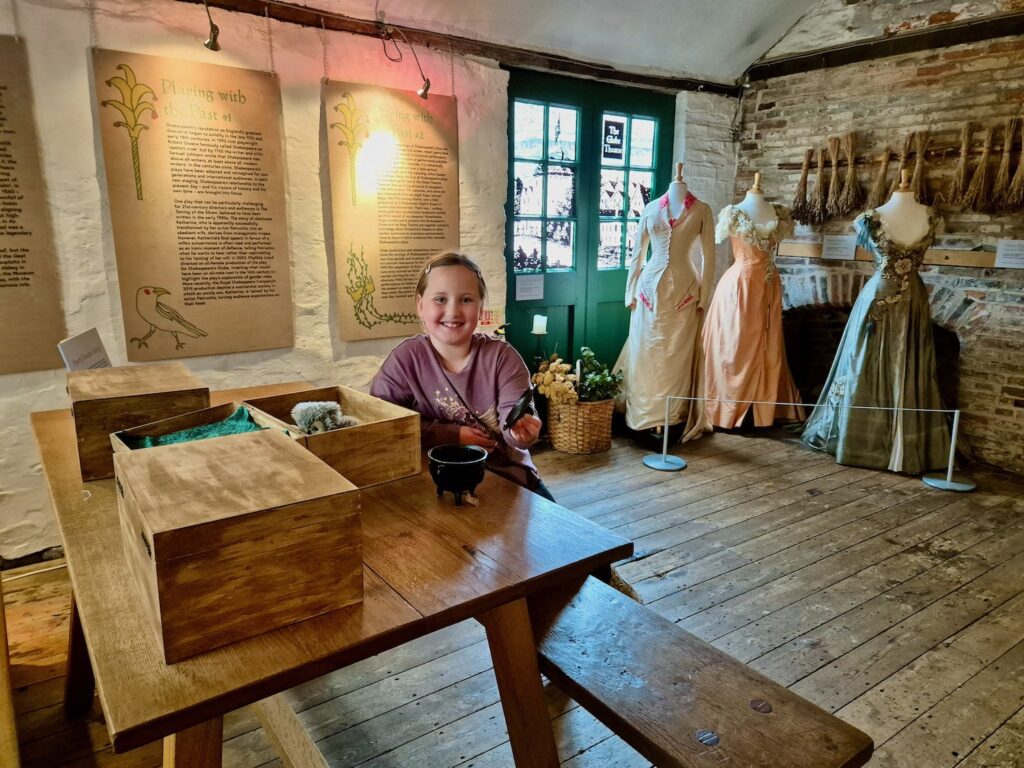 The Bard at Barley Hall - Erin sat with the displays with costumes behind her