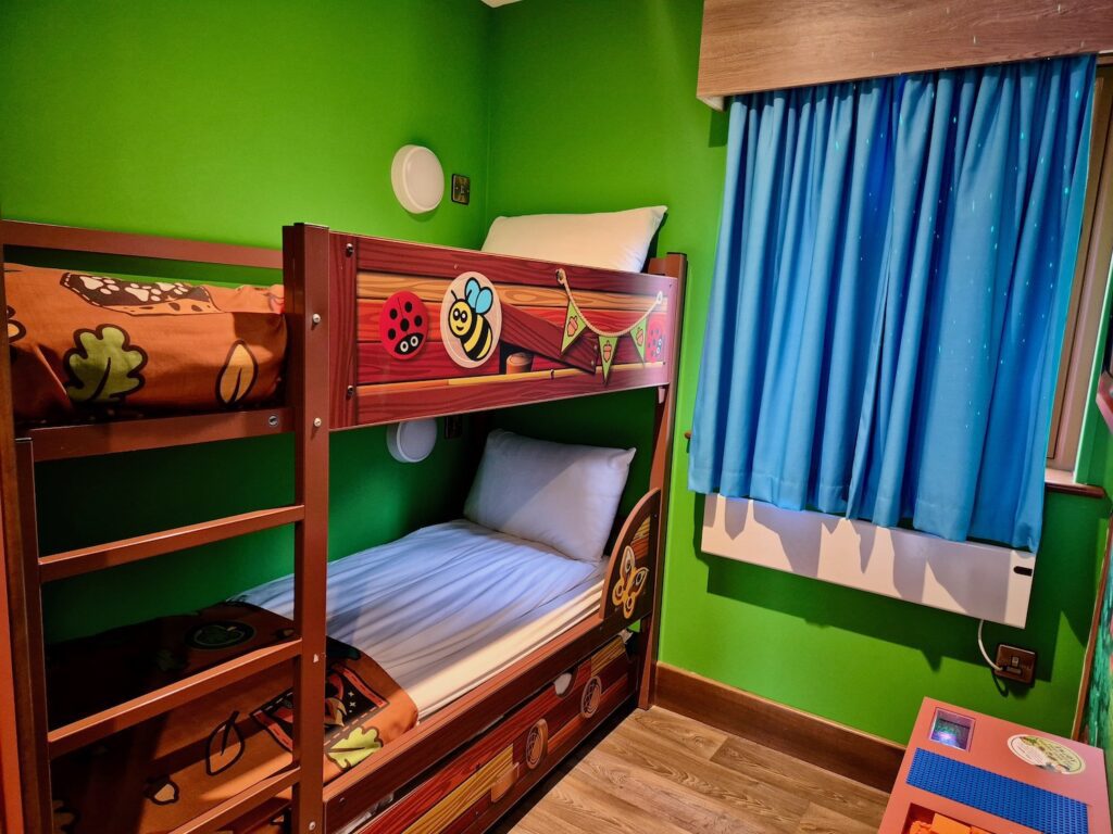 Bunk beds in a standard woodland lodge at Legoland's Woodland Village