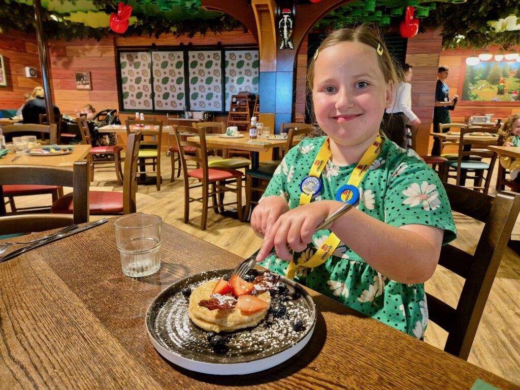 Erin eating pancakes at the Clubhouse