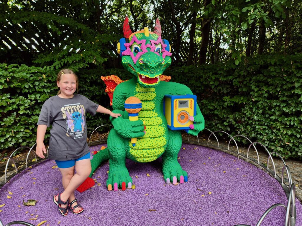 Erin with a Lego dragon