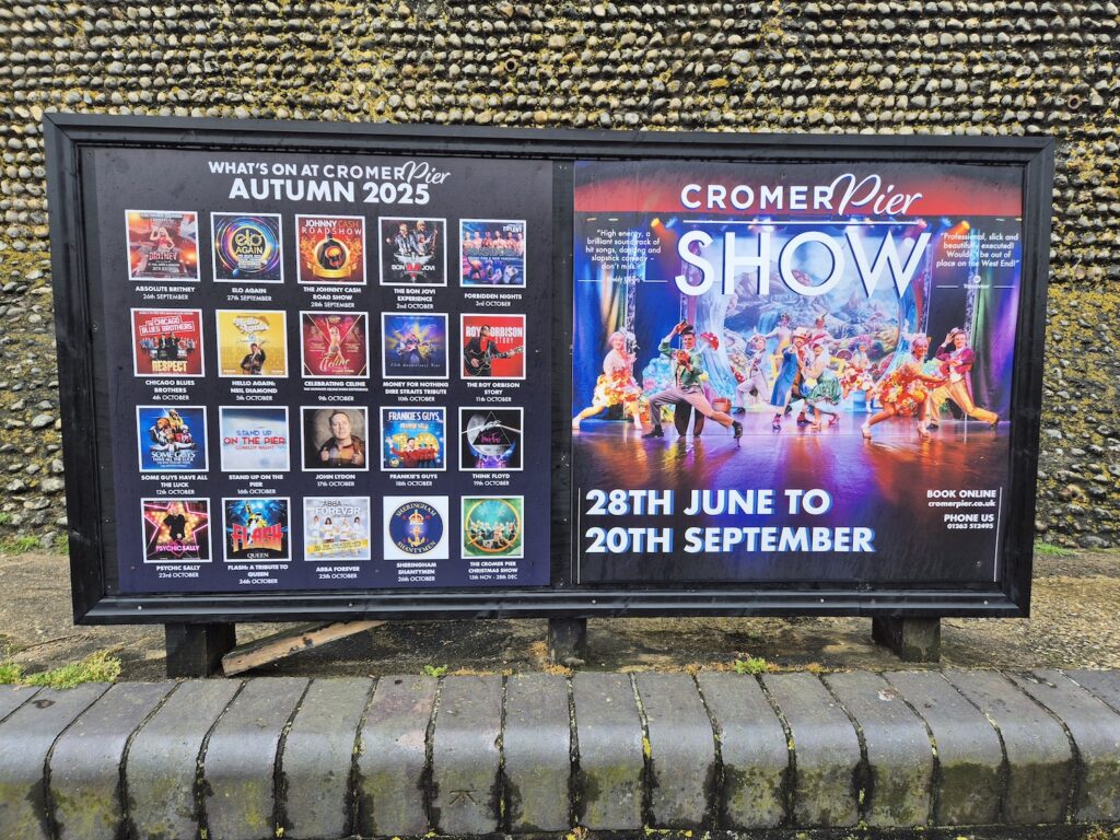 Advertising board showing upcoming shows at the Cromer Pier. 